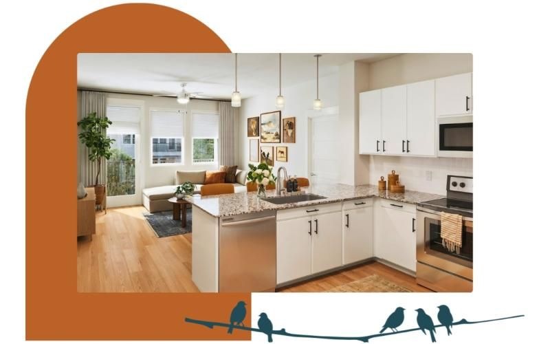 a kitchen with white cabinets